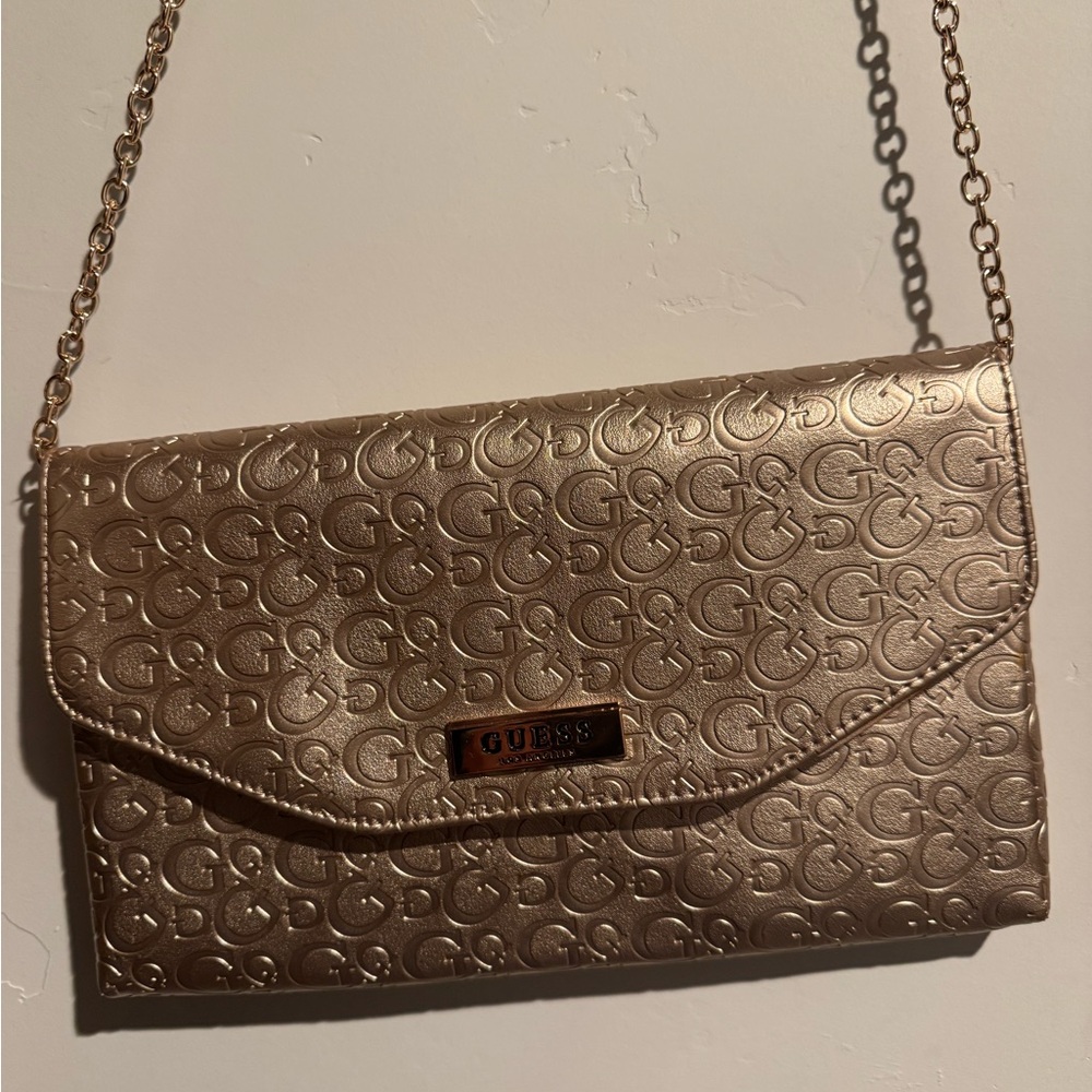 GUESS Metallic Rose Gold Embossed Logo Chain Shoulder Clutch